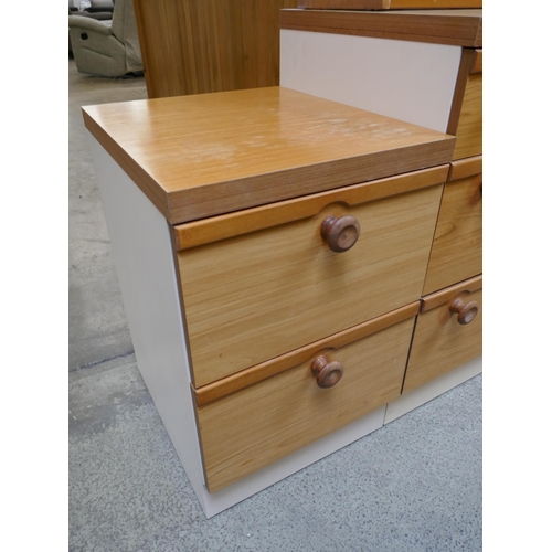 1455 - A bookcase, chest of drawers and bedside chest