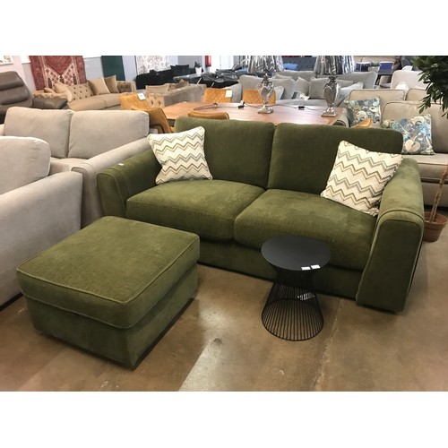 1306 - A moss green velvet three seater sofa and footstool