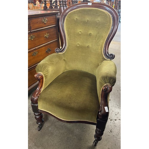 171 - A Victorian mahogany and green fabric upholstered armchair