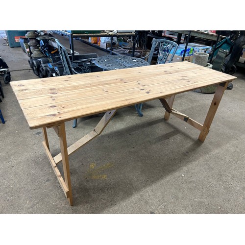 2349 - 5 Pine folding trestle tables