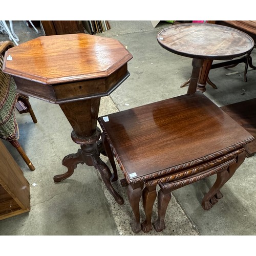 235 - A Victorian carved mahogany lady's sewing table, a nest of tables and a tilt top occasional table