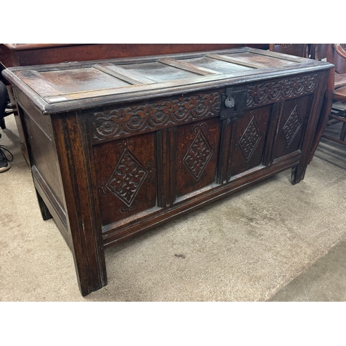 201 - A William III carved oak coffer