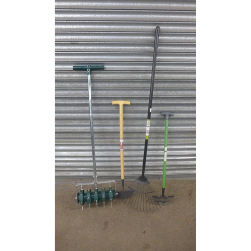 2341 - 4 lawn tools - 2 edgers, a lawn aerator and a rake