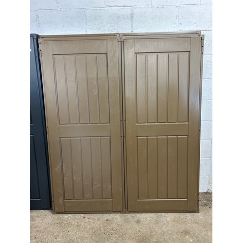 2354 - A pair of brown plastic shed doors