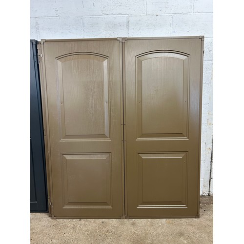 2355 - A pair of brown plastic shed doors