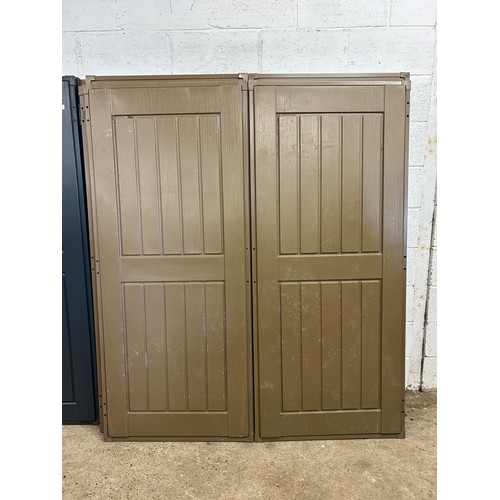 2356 - A pair of brown plastic shed doors