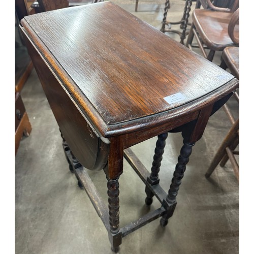 238 - An oak bobbin turned gateleg table