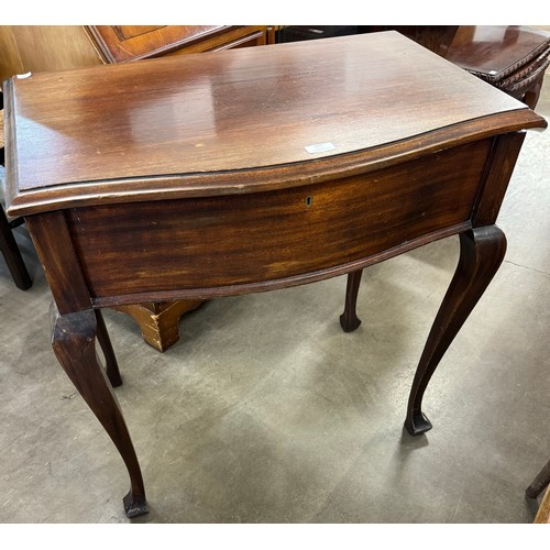 237 - A mahogany canteen of cutlery table, containing faux ivory handled flatware