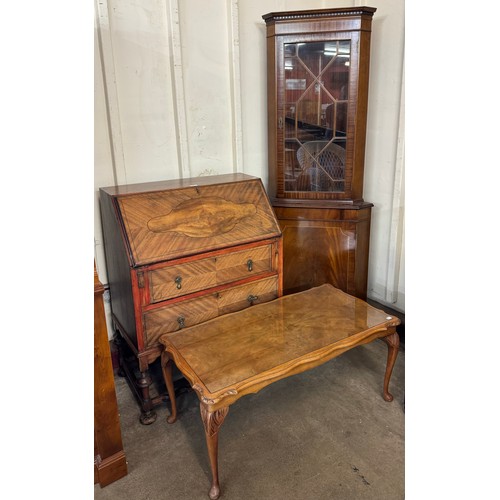 248 - An inlaid mahogany corner cabinet and a coffee table