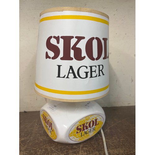 364 - A porcelain Skol Lager advertising lamp