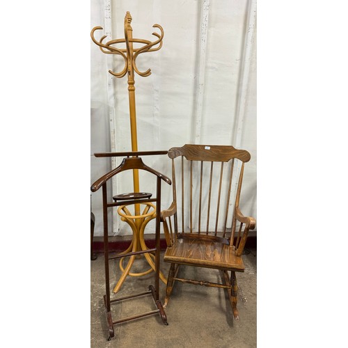 275 - A rocking chair, a coat stand and valet stand