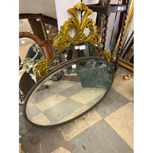 390 - A gilt framed mirror and two other mirrors