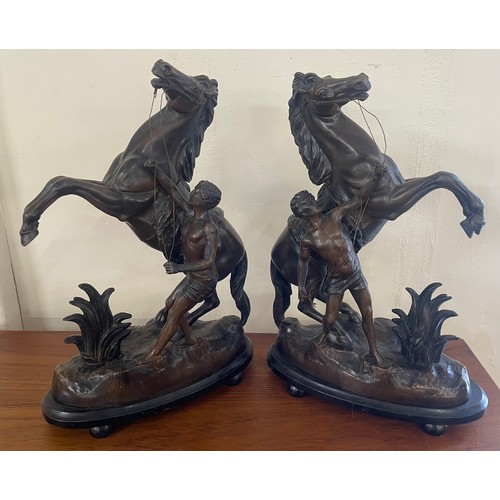 411 - A pair of French spelter figures of Marley horses