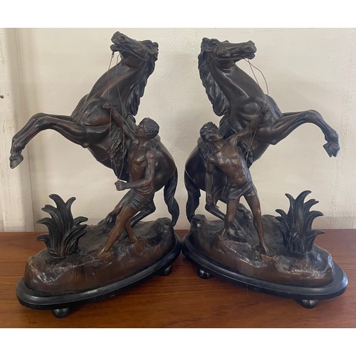 411 - A pair of French spelter figures of Marley horses