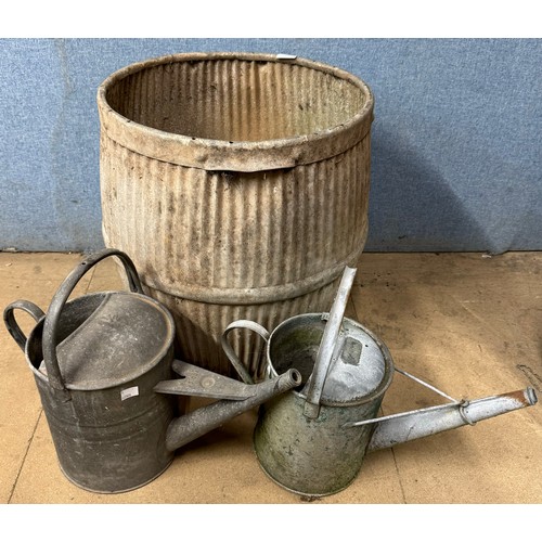 302 - A galvanised dolly tub and two watering cans