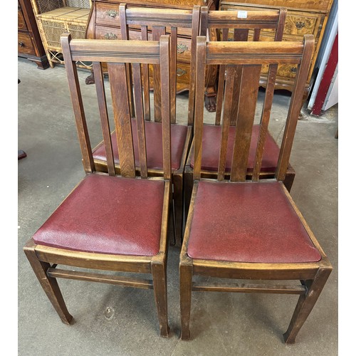 220B - A set of four beech dining chairs