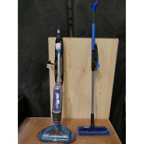 3384 - Bissell Spinwave floor cleaner and a Maxx Force broom. *This lot requires a UK adaptor