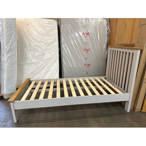 1426 - A grey painted and oak single bedframe