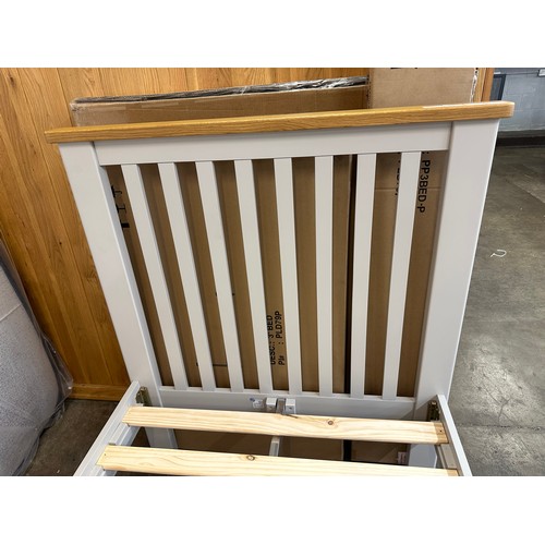 1426 - A grey painted and oak single bedframe