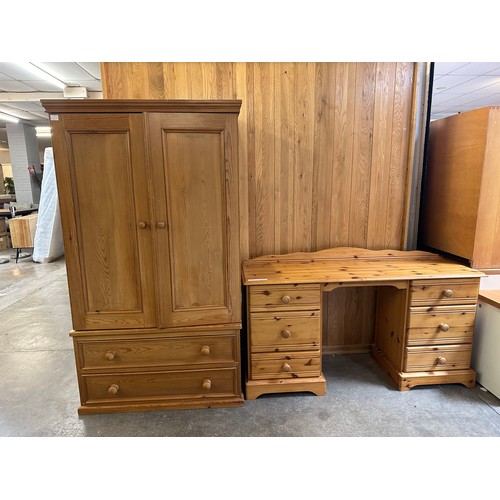 1498 - A two door pine wardrobe and dressing table