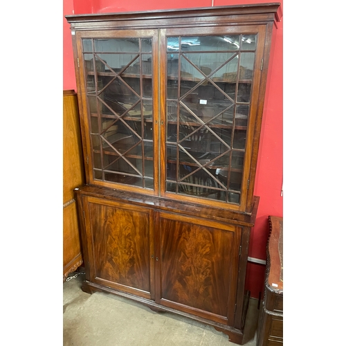 421 - An Edward VII mahogany and astragal glazed four door bookcase