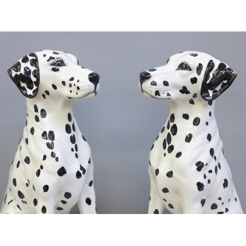 1048 - A pair of Royal Doulton dalmatian fireside dogs