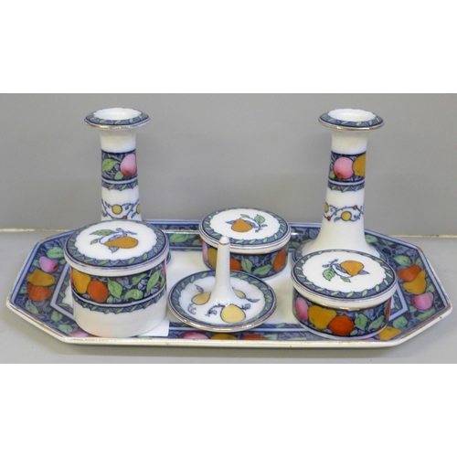 704 - A Lansdown dressing table set comprising tray, two candle sticks, ring holder, two medium lidded jar... 