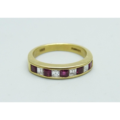 1169 - An 18ct gold, ruby and diamond ring, 3.3g, I