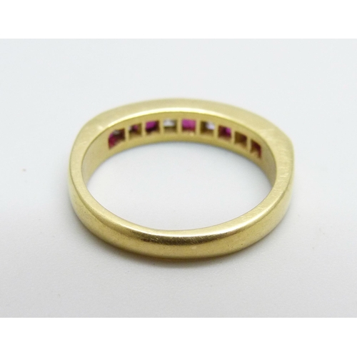 1169 - An 18ct gold, ruby and diamond ring, 3.3g, I