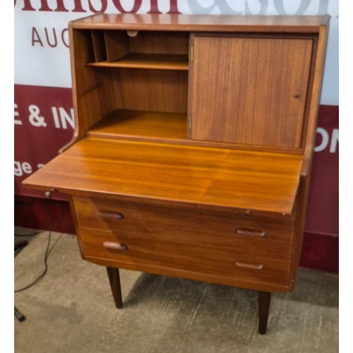 18 - A Danish teak secretary chest of drawers