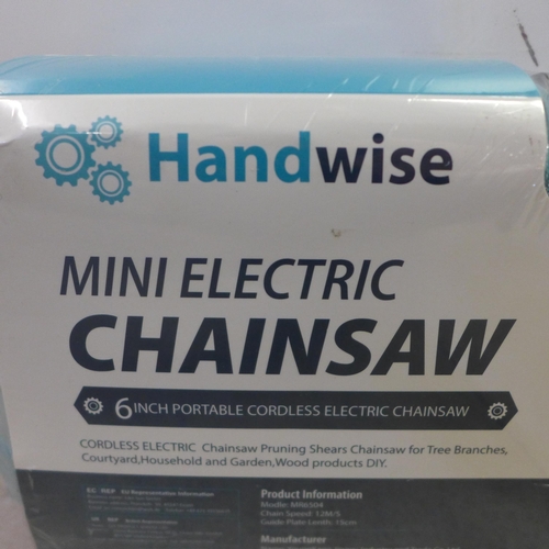 2008 - A HandWise mini electric 6” cordless chainsaw - sealed in packaging