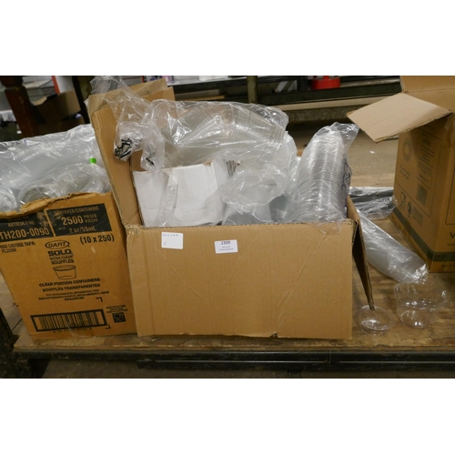 2309 - A large quantity of assorted clear plastic pots and lids