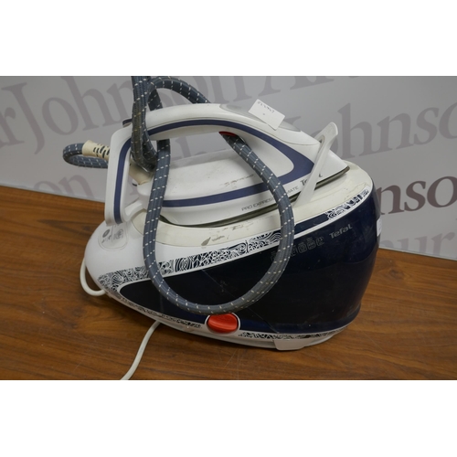 2318 - A Tefal Pro Express Ultimate steam generator iron