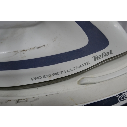 2318 - A Tefal Pro Express Ultimate steam generator iron