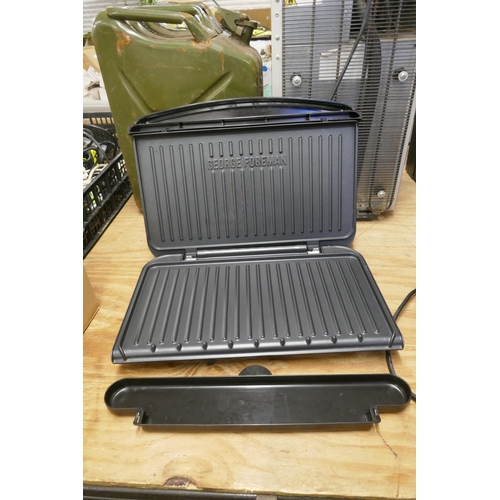 2323 - A George Foreman model 25820 grill and an Ambiano family grill