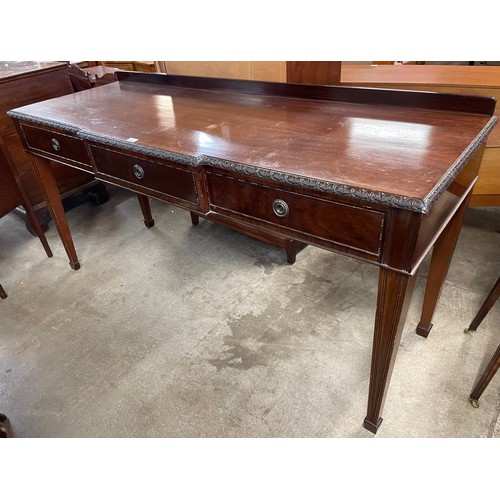 156 - An Edward VII mahogany three drawer breakfront serving table