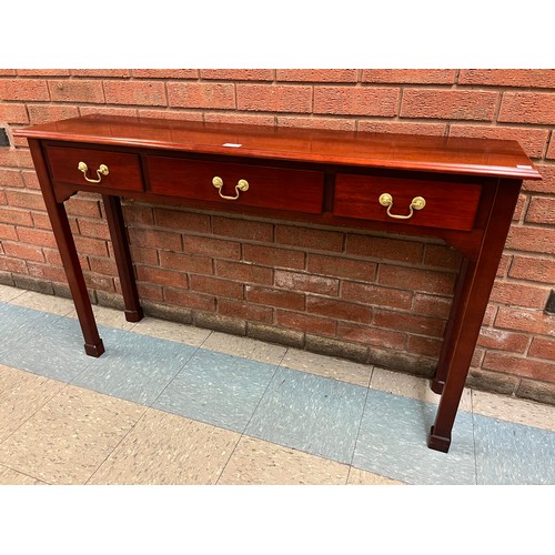 169 - A Victorian style mahogany three drawer serving table