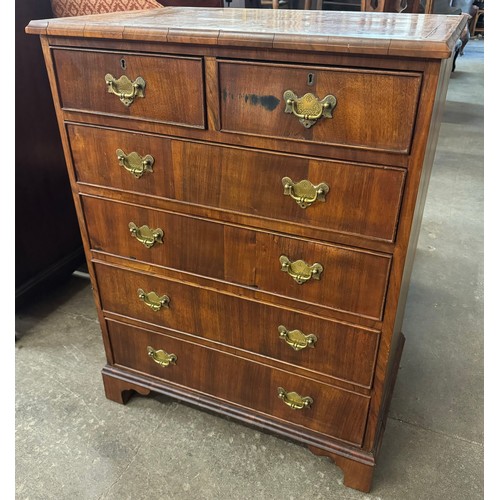 113 - A George I style walnut chest of drawers