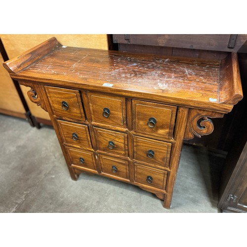 147 - A 19th Century style Chinese hardwood chest of drawers