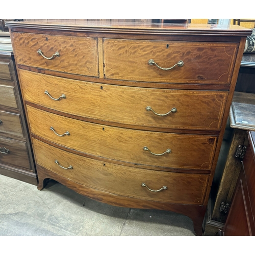 183 - A George III inlaid mahogany bow front chest of drawers