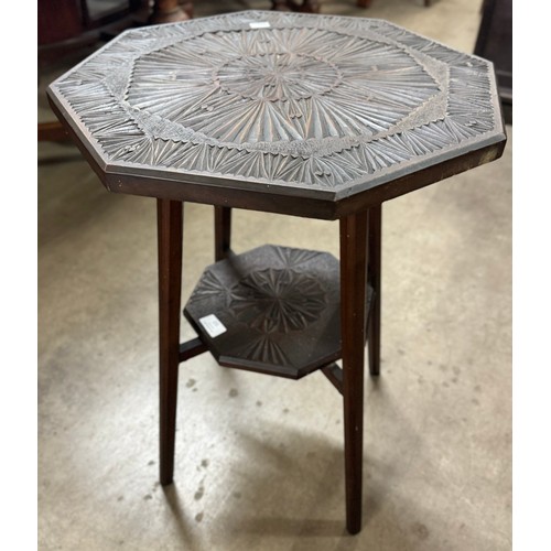 155 - A late Victorian carved top octagonal occasional table
