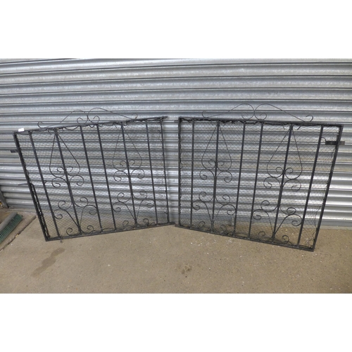 2167 - A pair of 3.5ft x 3ft metal driveway gates and 6 decorative cast metal spindles