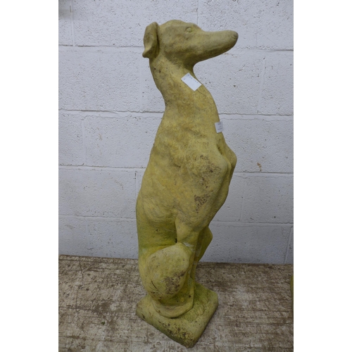 2181 - A pair of sandstone effect concrete greyhound figures and a terracotta chimney pot