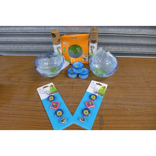 2232 - A selection of pet toys including hamster exercise balls, bird feeders, bird toys etc.