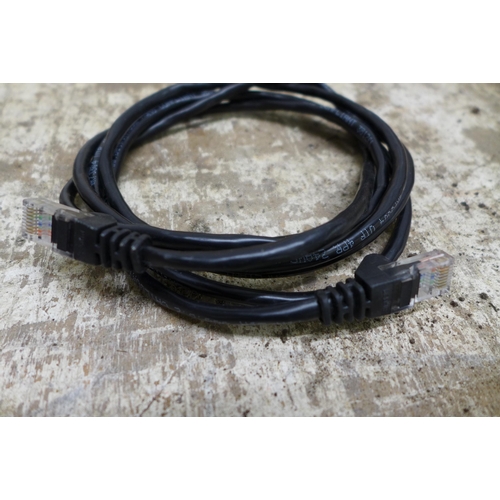 2252 - A box of approximately 200 power cables in an assortment of sizes and connections