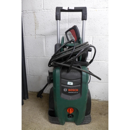 2253 - A Bosch Advanced Aquatak 140 pressure washer with hose and lance