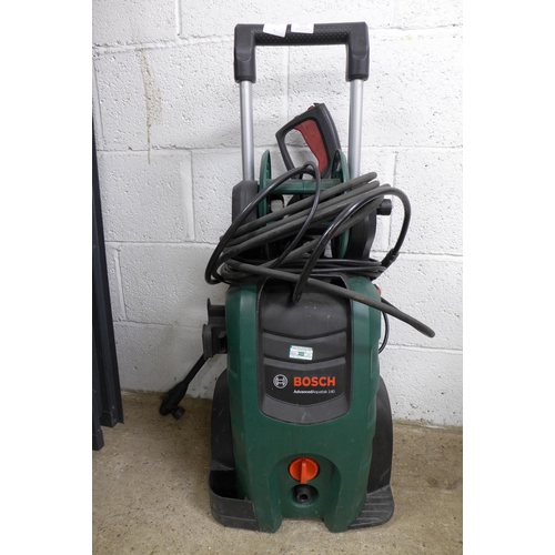 2253 - A Bosch Advanced Aquatak 140 pressure washer with hose and lance