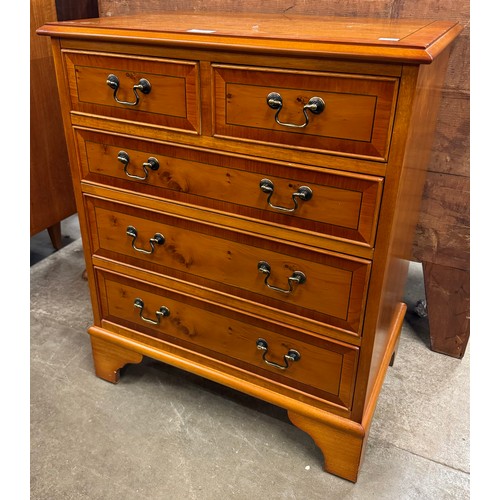 128 - A Regency style yew wood chest of drawers