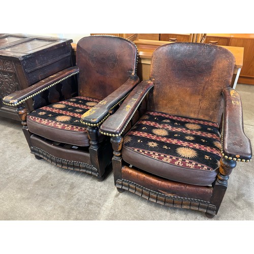 165 - A pair of Art Deco brown leather club chairs