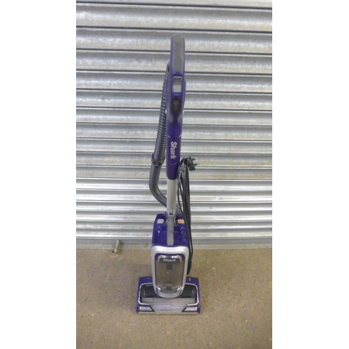 2118 - Dyson DC07 upright vacuum cleaner and a Shark AZ910UK powered lift-away upright vacuum cleaner